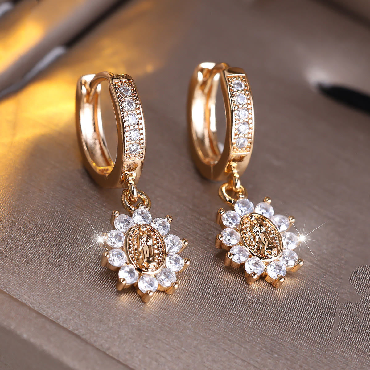 Our Lady Zircon Halo Huggie Earrings with Sunburst Pendant