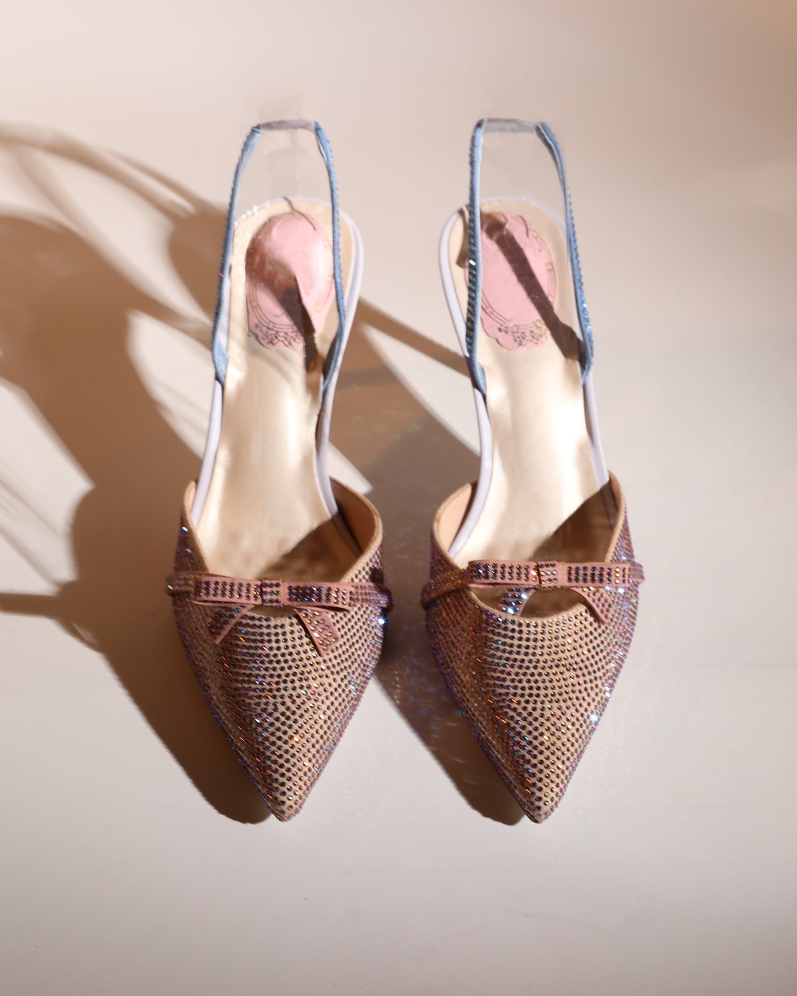 Easton Bow Rhinestone Slingback Pumps In Champagne